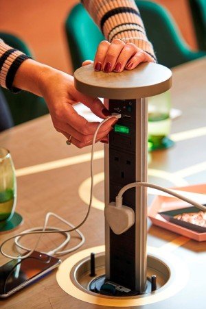Plugs in table means you can charge without worrying about floor cables view